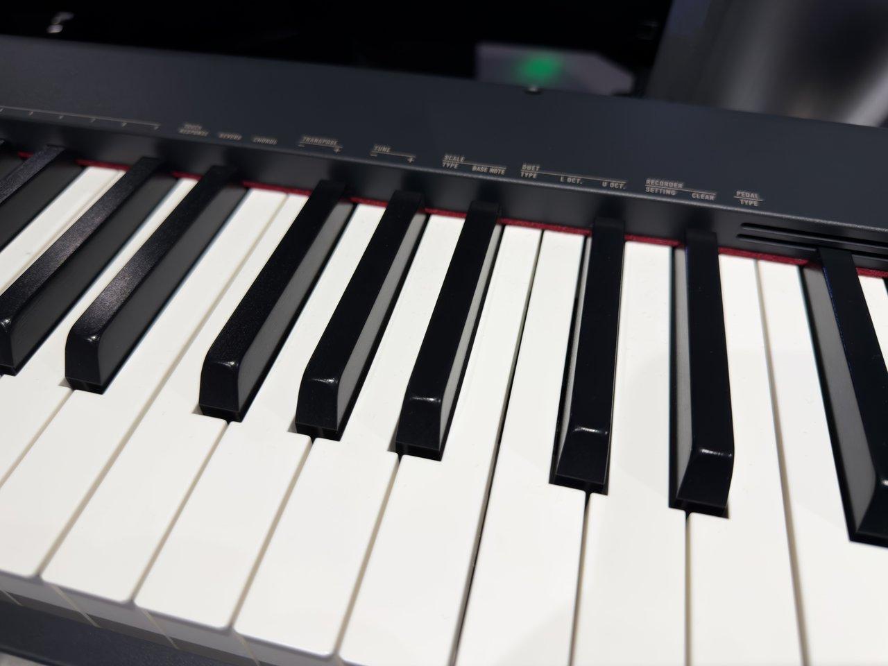 Menu de transposition sur digital piano pour ajuster facilement la tonalité et faciliter la pratique musicale.